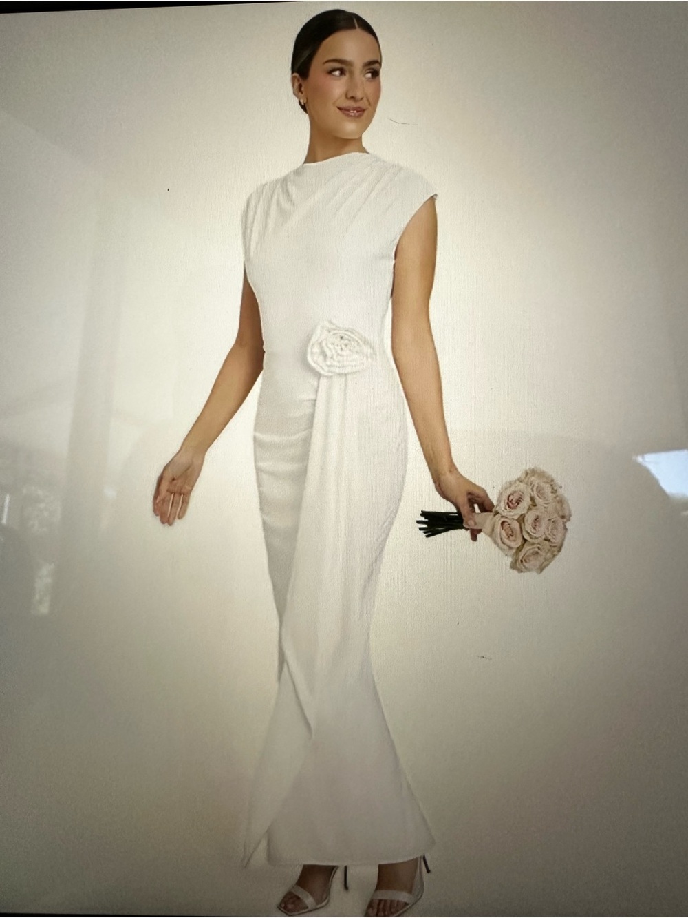 Minimalist White Cap-Sleeve Wedding Gown with Rosette Accent